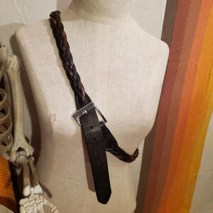 Brown leather braided belt with silver buckle